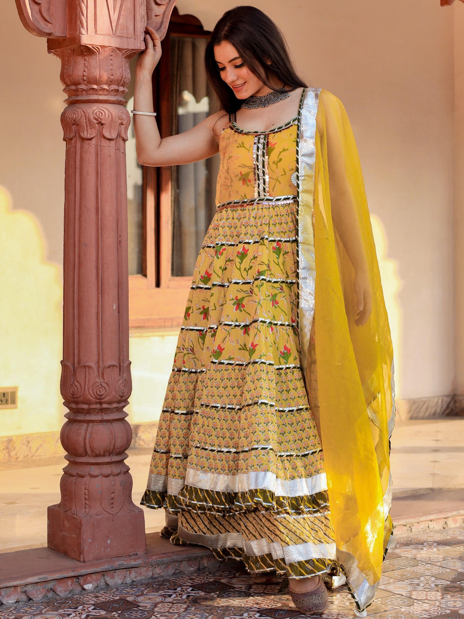 Divena Yellow Cotton Sleeves less anarkali Skirt Set With Dupatta - divenaworld.com